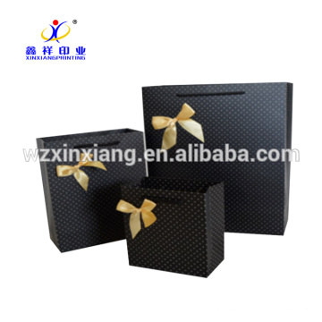 ¡Bolso modificado para requisitos particulares del regalo del papel de impresión del color del Bowknot del papel revestido de la fábrica de China 250gsm!